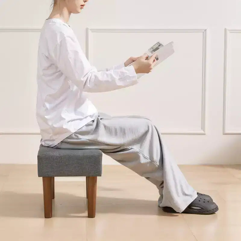 Petit tabouret repose-pieds capitonné, pouf repose-pieds rembourré avec pieds